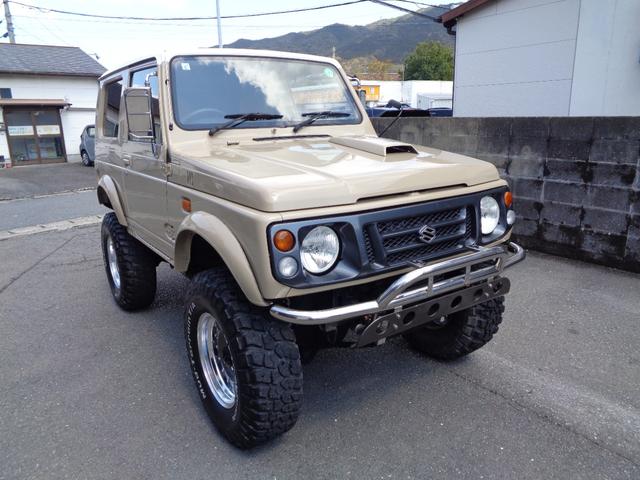 ジムニー ワイルドウインド　禁煙車　リフトアップ　１５インチアルミ　オーバーフェンダー　前後社外バンパー　外マフラー　シートカバー　ＬＥＤヘッドランプ　ＣＤデッキ　Ｂｌｕｅｔｏｏｔｈ　ＵＳＢ　新品ＥＴＣ　リアガラスフィルム施工（3枚目）