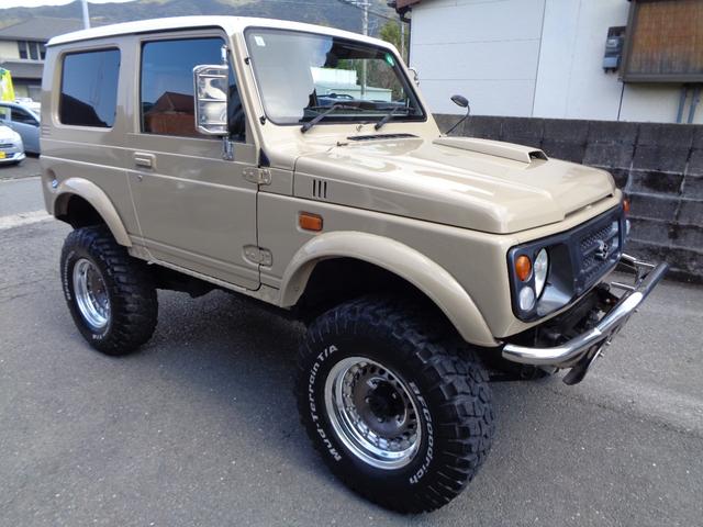 ジムニー ワイルドウインド　禁煙車　リフトアップ　１５インチアルミ　オーバーフェンダー　前後社外バンパー　外マフラー　シートカバー　ＬＥＤヘッドランプ　ＣＤデッキ　Ｂｌｕｅｔｏｏｔｈ　ＵＳＢ　新品ＥＴＣ　リアガラスフィルム施工（5枚目）