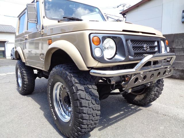 ジムニー ワイルドウインド　禁煙車　リフトアップ　１５インチアルミ　オーバーフェンダー　前後社外バンパー　外マフラー　シートカバー　ＬＥＤヘッドランプ　ＣＤデッキ　Ｂｌｕｅｔｏｏｔｈ　ＵＳＢ　新品ＥＴＣ　リアガラスフィルム施工（7枚目）