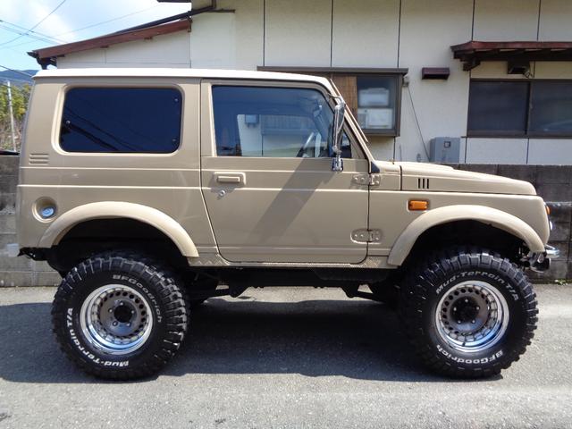 ジムニー ワイルドウインド　禁煙車　リフトアップ　１５インチアルミ　オーバーフェンダー　前後社外バンパー　外マフラー　シートカバー　ＬＥＤヘッドランプ　ＣＤデッキ　Ｂｌｕｅｔｏｏｔｈ　ＵＳＢ　新品ＥＴＣ　リアガラスフィルム施工（8枚目）