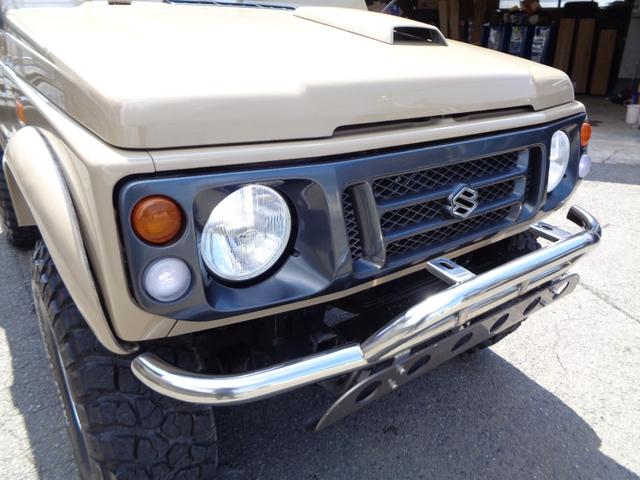 ジムニー ワイルドウインド　禁煙車　リフトアップ　１５インチアルミ　オーバーフェンダー　前後社外バンパー　外マフラー　シートカバー　ＬＥＤヘッドランプ　ＣＤデッキ　Ｂｌｕｅｔｏｏｔｈ　ＵＳＢ　新品ＥＴＣ　リアガラスフィルム施工（48枚目）