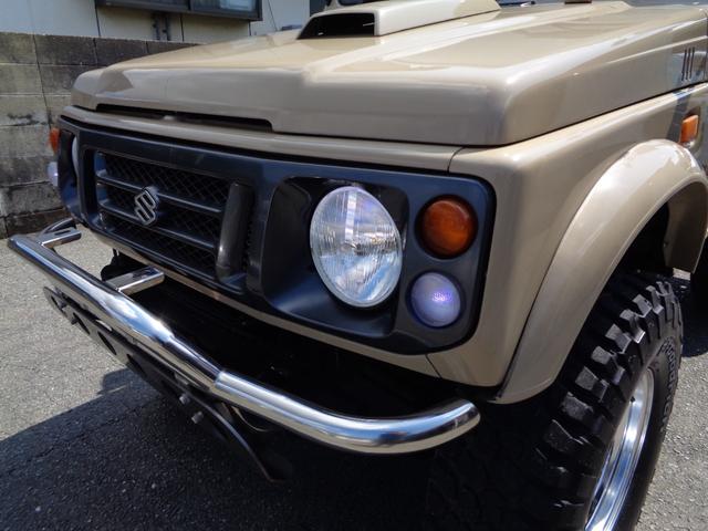 ジムニー ワイルドウインド　禁煙車　リフトアップ　１５インチアルミ　オーバーフェンダー　前後社外バンパー　外マフラー　シートカバー　ＬＥＤヘッドランプ　ＣＤデッキ　Ｂｌｕｅｔｏｏｔｈ　ＵＳＢ　新品ＥＴＣ　リアガラスフィルム施工（49枚目）