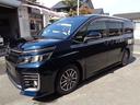 ヴォクシー ZS 1年保証 禁煙車 8人乗 プッシュスタート&スマートキー2個 両側電動ドア 11インチ後席モニター 純正SDナビ フルセグTV DVD再生 Bluetooth Bカメラ ETC アイドリングストップ 中古車画像_4