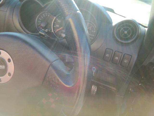 コペン アクティブトップ　ＤスポーツＥＣＵ　車高調　バックカメラ　ＳＤナビ　フルセグＴＶ　Ｂｌｕｅｔｏｏｔｈ　ＣＤ／ＤＶＤ　ＭＯＭＯステアリング　前後ドラレコ　ＥＴＣ　ＨＩＤライト　フォグランプ　社外１５インチＡＷ　キーレス（5枚目）