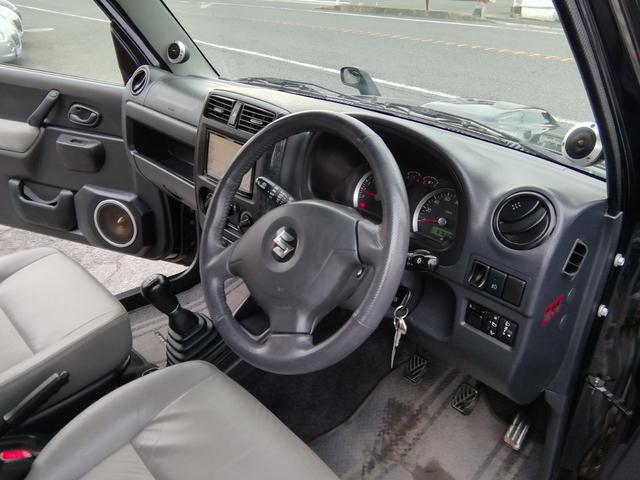 ジムニー ランドベンチャー　走行６７６３０ｋｍ！　５速ＭＴ　４ＷＤ切替　ＳＤナビ　ワンセグＴＶ　Ｂｌｕｅｔｏｏｔｈ　ＥＴＣ　背面タイヤ　ルーフレール　電動格納ミラー　１６インチアルミホイール　キーレス　エアコン　ＰＳ　ＰＷ（34枚目）