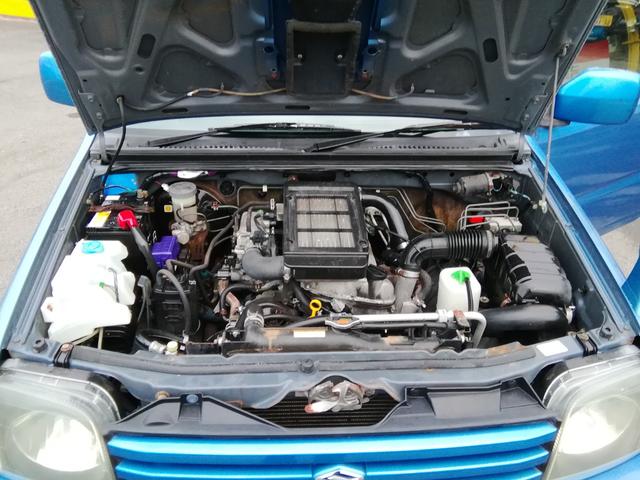 ジムニー XC 走行89520km 背面タイヤ ルーフレール 電動格納ミラー フォグランプ ETC CD再生 キーレス 16インチアルミホイール エアコン パワーステアリング ABS ダブルエアバック(3枚目)