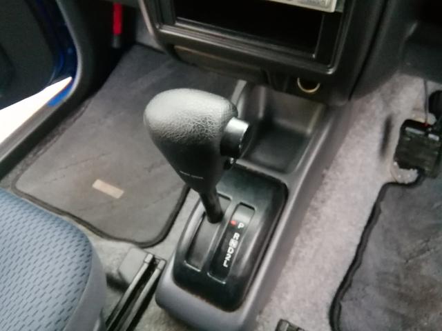 ジムニー XC 走行89520km 背面タイヤ ルーフレール 電動格納ミラー フォグランプ ETC CD再生 キーレス 16インチアルミホイール エアコン パワーステアリング ABS ダブルエアバック(5枚目)