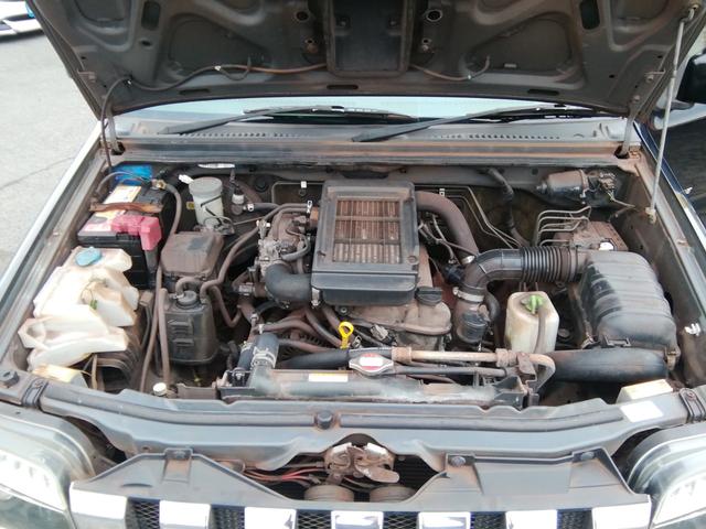 ジムニー ランドベンチャー　４ＷＤ切替　リフトアップ　ＨＤＤナビ　ワンセグＴＶ　ＣＤ／ＤＶＤ再生　社外１６インチＡＷ　フォグランプ　ハードカバー付き背面タイヤ　ハーフレザーシート　電動格納ミラー　ライトレベライザー　エアコン（2枚目）