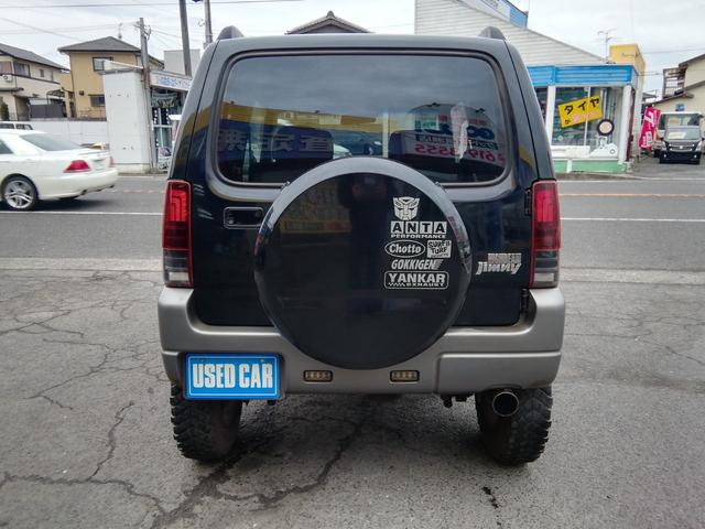 ジムニー ランドベンチャー　４ＷＤ切替　リフトアップ　ＨＤＤナビ　ワンセグＴＶ　ＣＤ／ＤＶＤ再生　社外１６インチＡＷ　フォグランプ　ハードカバー付き背面タイヤ　ハーフレザーシート　電動格納ミラー　ライトレベライザー　エアコン（3枚目）