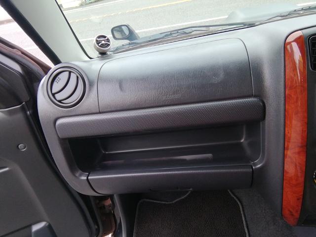 ジムニー ランドベンチャー　４ＷＤ切替　リフトアップ　ＨＤＤナビ　ワンセグＴＶ　ＣＤ／ＤＶＤ再生　社外１６インチＡＷ　フォグランプ　ハードカバー付き背面タイヤ　ハーフレザーシート　電動格納ミラー　ライトレベライザー　エアコン（4枚目）