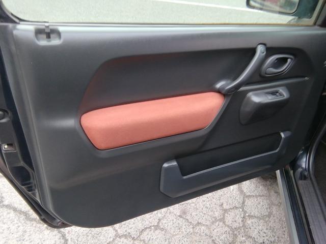 ジムニー ランドベンチャー　４ＷＤ切替　リフトアップ　ＨＤＤナビ　ワンセグＴＶ　ＣＤ／ＤＶＤ再生　社外１６インチＡＷ　フォグランプ　ハードカバー付き背面タイヤ　ハーフレザーシート　電動格納ミラー　ライトレベライザー　エアコン（15枚目）