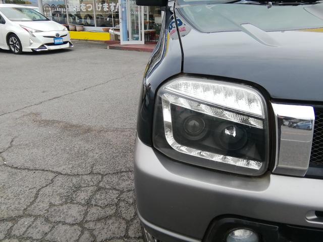 ジムニー ランドベンチャー　４ＷＤ切替　リフトアップ　ＨＤＤナビ　ワンセグＴＶ　ＣＤ／ＤＶＤ再生　社外１６インチＡＷ　フォグランプ　ハードカバー付き背面タイヤ　ハーフレザーシート　電動格納ミラー　ライトレベライザー　エアコン（29枚目）