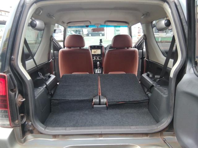 ジムニー ランドベンチャー　４ＷＤ切替　リフトアップ　ＨＤＤナビ　ワンセグＴＶ　ＣＤ／ＤＶＤ再生　社外１６インチＡＷ　フォグランプ　ハードカバー付き背面タイヤ　ハーフレザーシート　電動格納ミラー　ライトレベライザー　エアコン（37枚目）