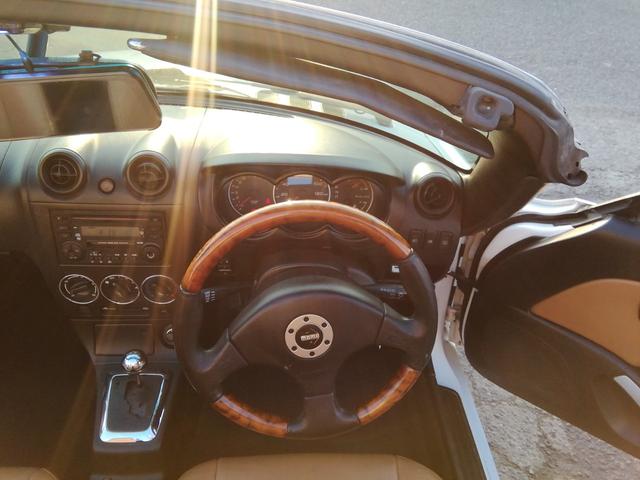 コペン タンレザーエディション　電動オープン　ＭＯＭＯステアリング　両席ヒーター付革シート　ＣＤ再生　フォグランプ　ＥＴＣ　キーレス　１４インチアルミホイール　パワーステアリング　パワーウィンドウ　ＡＢＳ　ダブルエアバック（4枚目）