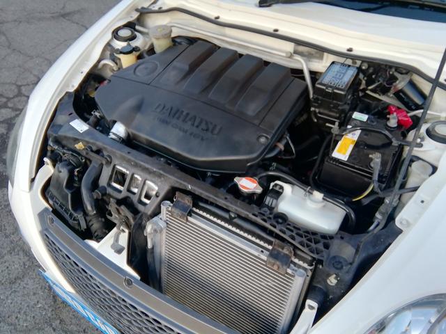 コペン タンレザーエディション　電動オープン　ＭＯＭＯステアリング　両席ヒーター付革シート　ＣＤ再生　フォグランプ　ＥＴＣ　キーレス　１４インチアルミホイール　パワーステアリング　パワーウィンドウ　ＡＢＳ　ダブルエアバック（16枚目）