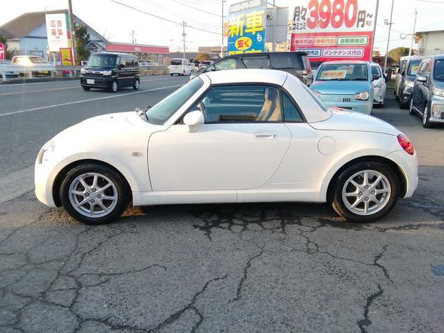 コペン タンレザーエディション　電動オープン　ＭＯＭＯステアリング　両席ヒーター付革シート　ＣＤ再生　フォグランプ　ＥＴＣ　キーレス　１４インチアルミホイール　パワーステアリング　パワーウィンドウ　ＡＢＳ　ダブルエアバック（24枚目）