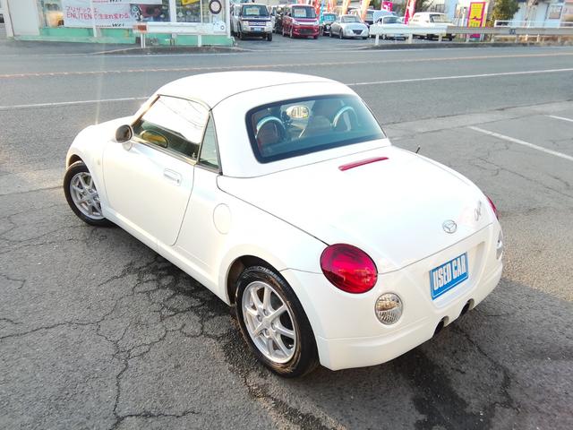 コペン タンレザーエディション　電動オープン　ＭＯＭＯステアリング　両席ヒーター付革シート　ＣＤ再生　フォグランプ　ＥＴＣ　キーレス　１４インチアルミホイール　パワーステアリング　パワーウィンドウ　ＡＢＳ　ダブルエアバック（26枚目）