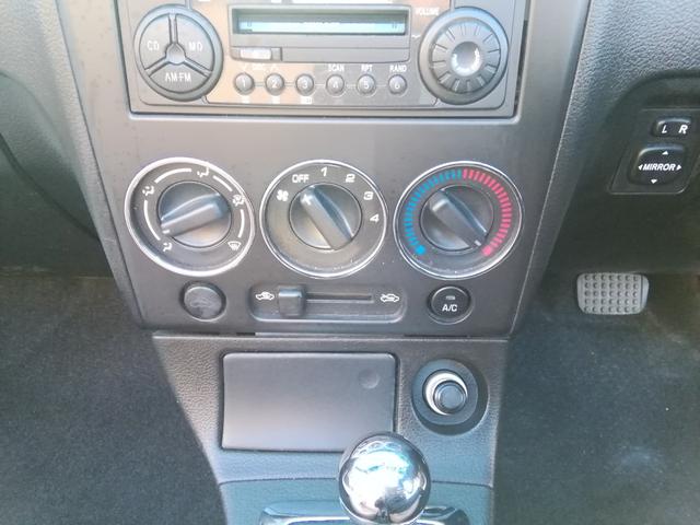 コペン タンレザーエディション　電動オープン　ＭＯＭＯステアリング　両席ヒーター付革シート　ＣＤ再生　フォグランプ　ＥＴＣ　キーレス　１４インチアルミホイール　パワーステアリング　パワーウィンドウ　ＡＢＳ　ダブルエアバック（30枚目）