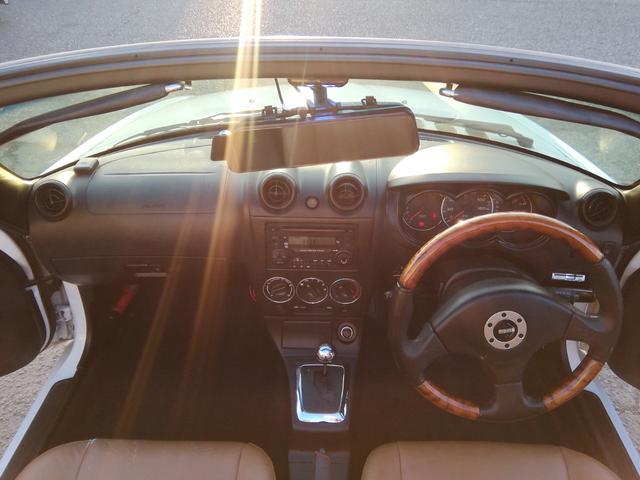 コペン タンレザーエディション　電動オープン　ＭＯＭＯステアリング　両席ヒーター付革シート　ＣＤ再生　フォグランプ　ＥＴＣ　キーレス　１４インチアルミホイール　パワーステアリング　パワーウィンドウ　ＡＢＳ　ダブルエアバック（33枚目）