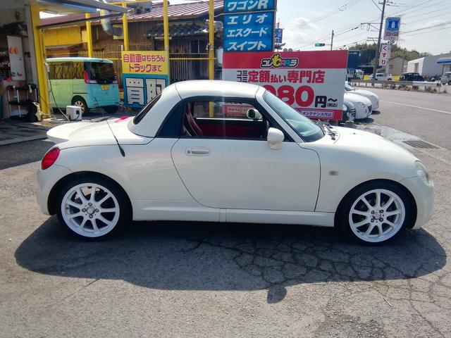 コペン アクティブトップ　ＳＤナビ　フルセグＴＶ　ＣＤ再生　両席ヒーター付赤革シート　ＭＯＭＯステアリング　フォグランプ　社外１６インチアルミホイール　ＥＴＣ　キーレス　ターボ　タイミングチェーン　エアコン　ＰＳ　ＰＷ　ＡＢＳ（9枚目）