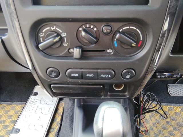 ジムニー ランドベンチャー　４ＷＤ切替　ハードカバー付き背面タイヤ　ルーフレール　１６インチアルミホイール　ＥＴＣ　電動格納ミラー　社外ＬＥＤヘッドライト　フォグランプ　キーレス　エアコン　パワーステアリング　パワーウィンドウ（25枚目）