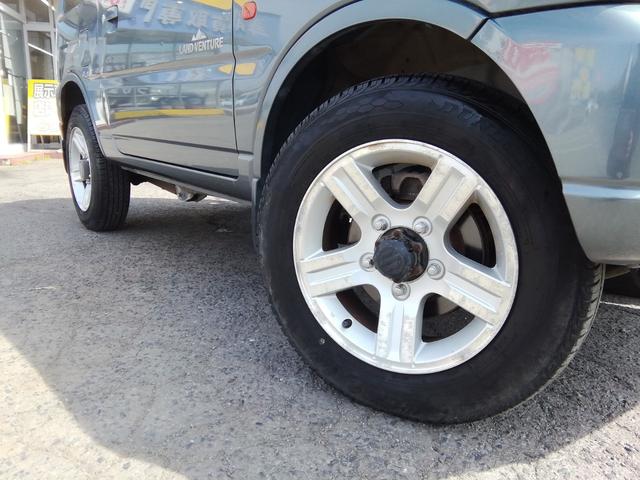 ジムニー ランドベンチャー　４ＷＤ切替　ハードカバー付き背面タイヤ　ルーフレール　１６インチアルミホイール　ＥＴＣ　電動格納ミラー　社外ＬＥＤヘッドライト　フォグランプ　キーレス　エアコン　パワーステアリング　パワーウィンドウ（33枚目）