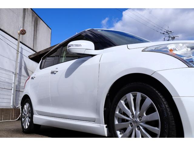 スイフト ＲＳ　車検整備２年付き・純正フルエアロ・ナビ・ワンセグＴＶ・ＣＤ／ＤＶＤビデオ再生・ＥＴＣ・社外ＨＫＳマフラー・スマートキー・プッシュスタート・ドライブレコーダー・オートエアコン・純正アルミホイール（2枚目）