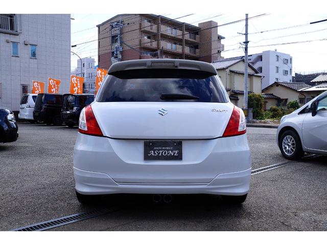 スイフト ＲＳ　車検整備２年付き・純正フルエアロ・ナビ・ワンセグＴＶ・ＣＤ／ＤＶＤビデオ再生・ＥＴＣ・社外ＨＫＳマフラー・スマートキー・プッシュスタート・ドライブレコーダー・オートエアコン・純正アルミホイール（12枚目）
