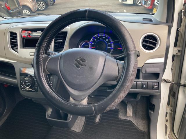 ワゴンＲ ＦＸリミテッド　カロッツェリアＣＤデッキ　プッシュエンジンスタート　スマートキー　電格ドアミラーウィンカー　革巻きステアリング　ＥＴＣ　助手席収納ＢＯＸ　ベンチシート（8枚目）