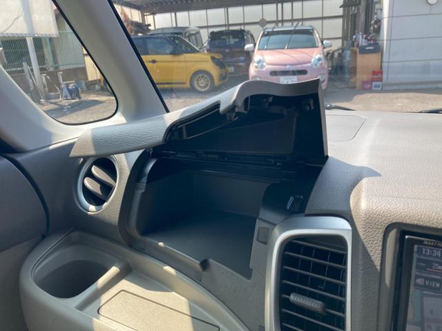 スペーシア Ｘ　後期モデル　クラリオンＨＤＤナビ　ワンセグＴＶ　ＤＶＤビデオ再生　ロールサンシェード　プッシュスタート　スマートキー　純正１４インチアルミ　助手席収納スペース　シートリフター　アイドリングストップ（17枚目）