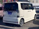 N-BOXカスタム G SSパッケージ あんしんパッケージ 衝突軽減ブレーキ 両側パワースライドドア ステアリングスイッチ クラッツィオ黒革調シートカバー Bluetooth USBポート バックモニター オートライト フォグランプ 中古車画像_4