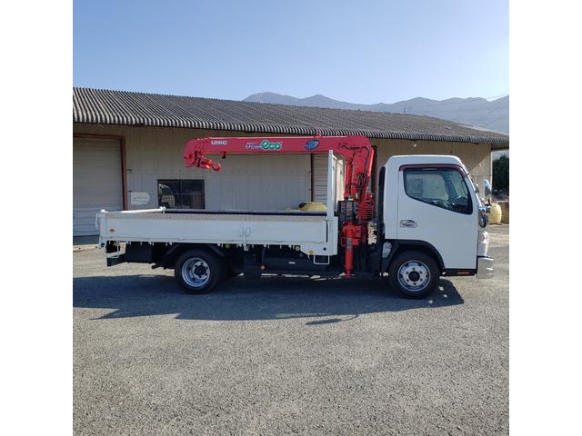 キャンター 4段ラジコン付きクレーン車 差し違いアウトリガー ICターボ 荷台鉄板張り(4枚目)