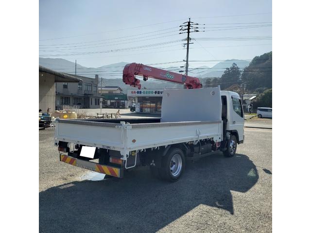 キャンター 4段ラジコン付きクレーン車 差し違いアウトリガー ICターボ 荷台鉄板張り(5枚目)