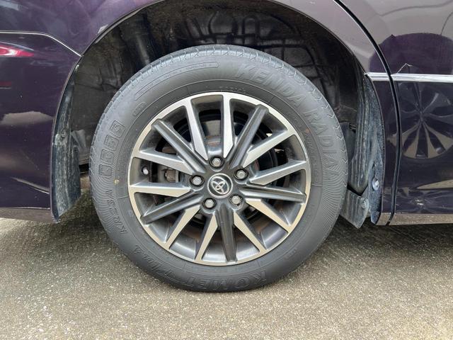 ヴォクシー 純正9インチナビ Bluetooth フリップダウンモニター フルセグ視聴 ETC パワスライドドア リアサンシェード フォグランプ 革巻きハンドル 純正アルミ スマートキー プッシュスタート(32枚目)