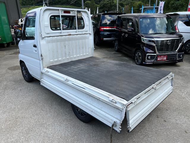 ミニキャブトラック ＶＸ－ＳＥ　純正オーディオ　社外アルミ　ブロックタイヤ　３方開　パートタイム４ＷＤ　純正ゴムマット　純正バイザー　ヘッドライトレベライザー（10枚目）