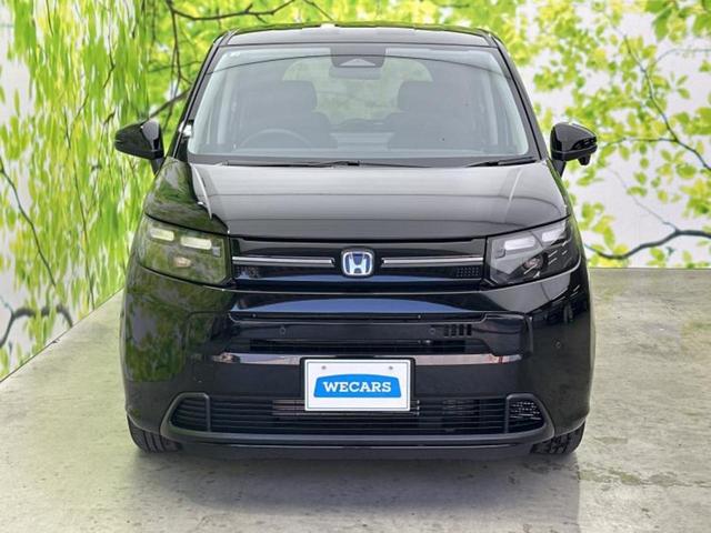 フリード ｅＨＥＶエアーＥＸ　純正　１１インチ　ナビ／ホンダセンシング／両側電動スライドドア／シートヒーター　前席／車線逸脱防止支援システム／シート　ハーフレザー／登録済未使用車／ヘッドランプ　ＬＥＤ／Ｂｌｕｅｔｏｏｔｈ接続（45枚目）