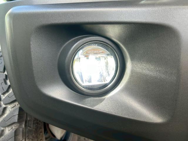 ジムニーシエラ ＪＣ　５速ＭＴ　ミリタリールック　ＪＡＯＳリフトアップキット　Ｍ／Ｔタイヤ　ルーフキャリア　サイドオーニング　ＬＥＤ作業灯　社外サイドステップ　ディスプレイオーディオ　ＥＴＣ　前後ドラレコ　ワンオーナー車（19枚目）