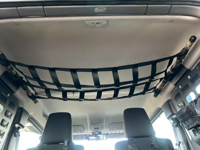 ジムニーシエラ ＪＣ　５速ＭＴ　ミリタリールック　ＪＡＯＳリフトアップキット　Ｍ／Ｔタイヤ　ルーフキャリア　サイドオーニング　ＬＥＤ作業灯　社外サイドステップ　ディスプレイオーディオ　ＥＴＣ　前後ドラレコ　ワンオーナー車（36枚目）