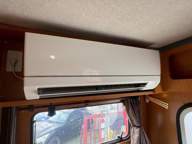 カムロード 　バンテック　ジル　家庭用エアコン　トリプルサブバッテリー　インバーター　デジタルインナーミラー　ＦＦヒーター　３ＷＡＹ冷蔵庫　電子レンジ　マルチルーム　カセットトイレ　給排水タンク　ボイラー（29枚目）
