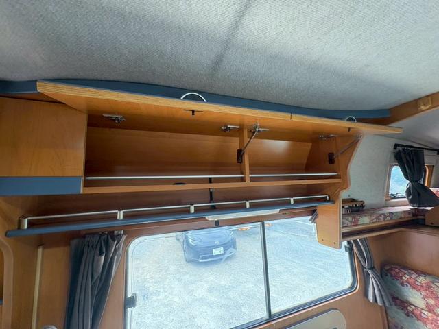 カムロード 　バンテック　ジル　家庭用エアコン　トリプルサブバッテリー　インバーター　デジタルインナーミラー　ＦＦヒーター　３ＷＡＹ冷蔵庫　電子レンジ　マルチルーム　カセットトイレ　給排水タンク　ボイラー（52枚目）