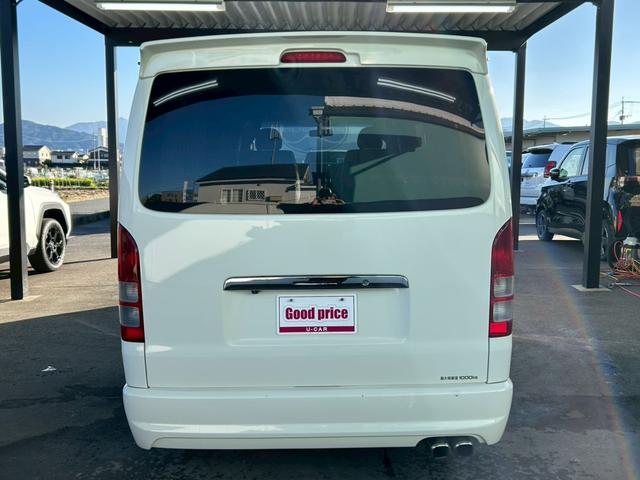 ハイエースバン ロングスーパーＧＬ　２．５Ｌディーゼルターボ　ＣＡＲＶＩＮベッドキット　ローダウン　社外フルエアロ　社外マフラー　ナビ　バックカメラ　ＥＴＣ　車検整備付き（5枚目）