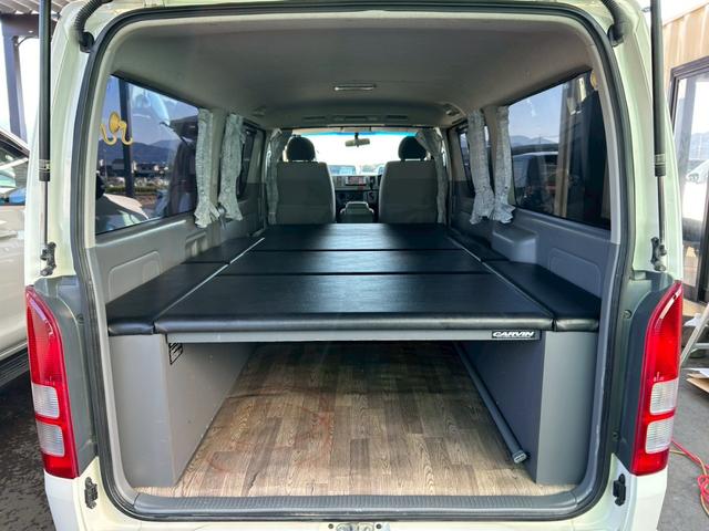 ハイエースバン ロングスーパーＧＬ　２．５Ｌディーゼルターボ　ＣＡＲＶＩＮベッドキット　ローダウン　社外フルエアロ　社外マフラー　ナビ　バックカメラ　ＥＴＣ　車検整備付き（20枚目）