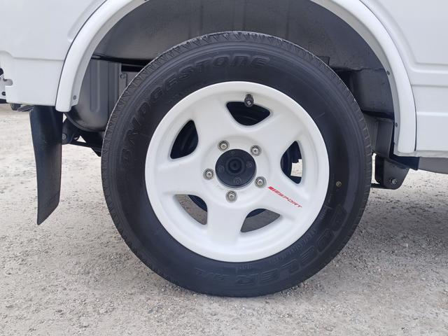 ジムニー EC 5速・社外16インチアルミ・ステアリングダンパー・社外マフラー・タイミングベルト交換済/R3年54630km・サクションホース・IPFオフロードランプ・※純正白から純正白全塗装※(18枚目)