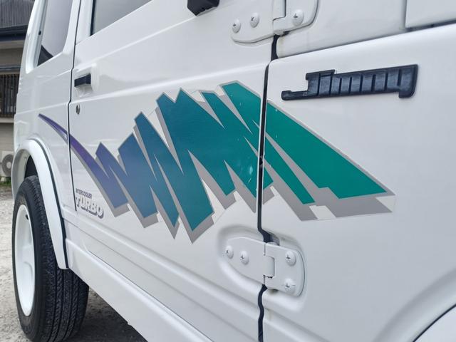 ジムニー EC 5速・社外16インチアルミ・ステアリングダンパー・社外マフラー・タイミングベルト交換済/R3年54630km・サクションホース・IPFオフロードランプ・※純正白から純正白全塗装※(21枚目)