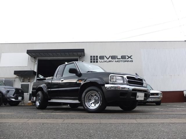 プロシード キャブプラス　車検Ｒ９年２月　アメリカンカスタム　新品ビレットハンドル　メッキ深リムホイール　グッドリッチ製ホワイトレタータイヤ　レザーシート　メッキバンパー前後　オーバーフェンダー　サイドステップ　荷台ＢＯＸ（3枚目）