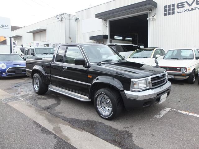 プロシード キャブプラス　車検Ｒ９年２月　アメリカンカスタム　新品ビレットハンドル　メッキ深リムホイール　グッドリッチ製ホワイトレタータイヤ　レザーシート　メッキバンパー前後　オーバーフェンダー　サイドステップ　荷台ＢＯＸ（8枚目）