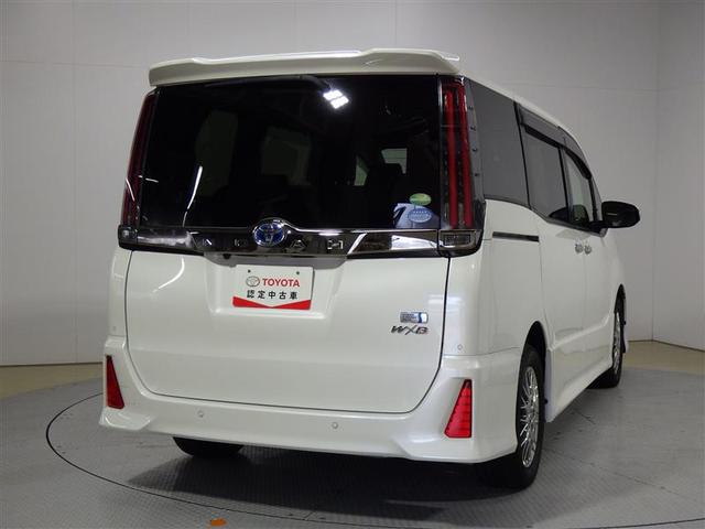 ノア ハイブリッドＳｉ　ダブルバイビーＩＩＩ　フルセグ　メモリーナビ　ＤＶＤ再生　後席モニター　バックカメラ　衝突被害軽減システム　ＥＴＣ　両側電動スライド　ＬＥＤヘッドランプ　乗車定員７人　３列シート　ワンオーナー　フルエアロ　盗難防止装置（3枚目）