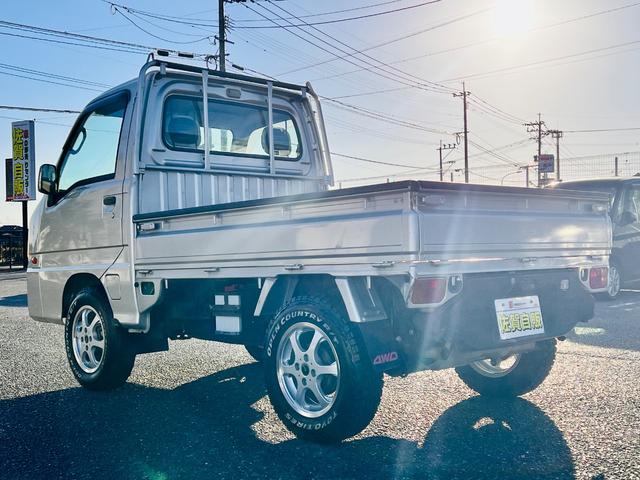 サンバートラック ＴＣ　リフトアップ・社外１４インチアルミ・ブロックタイヤ・キーレス・（5枚目）