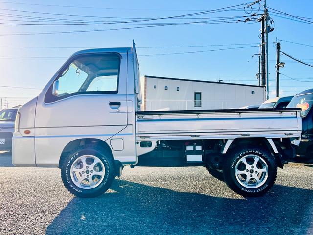 サンバートラック ＴＣ　リフトアップ・社外１４インチアルミ・ブロックタイヤ・キーレス・（7枚目）