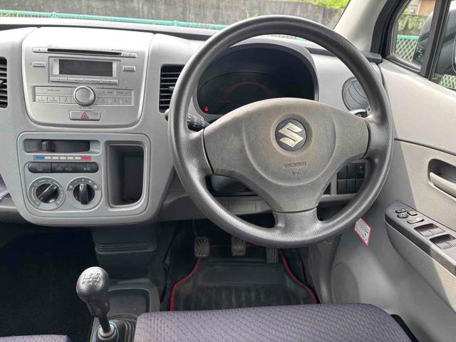 ワゴンＲ ＦＸ　キーレスエントリー　電動格納ミラー　ＭＴ　盗難防止システム　ＡＢＳ　ＣＤ　衝突安全ボディ　エアコン　パワーステアリング　パワーウィンドウ（9枚目）